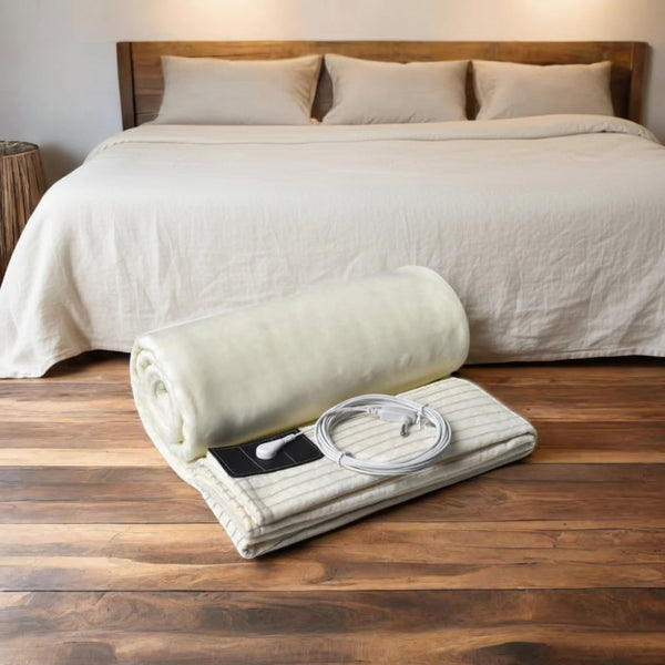 Grounding blanket shown on the floor of a bedroom